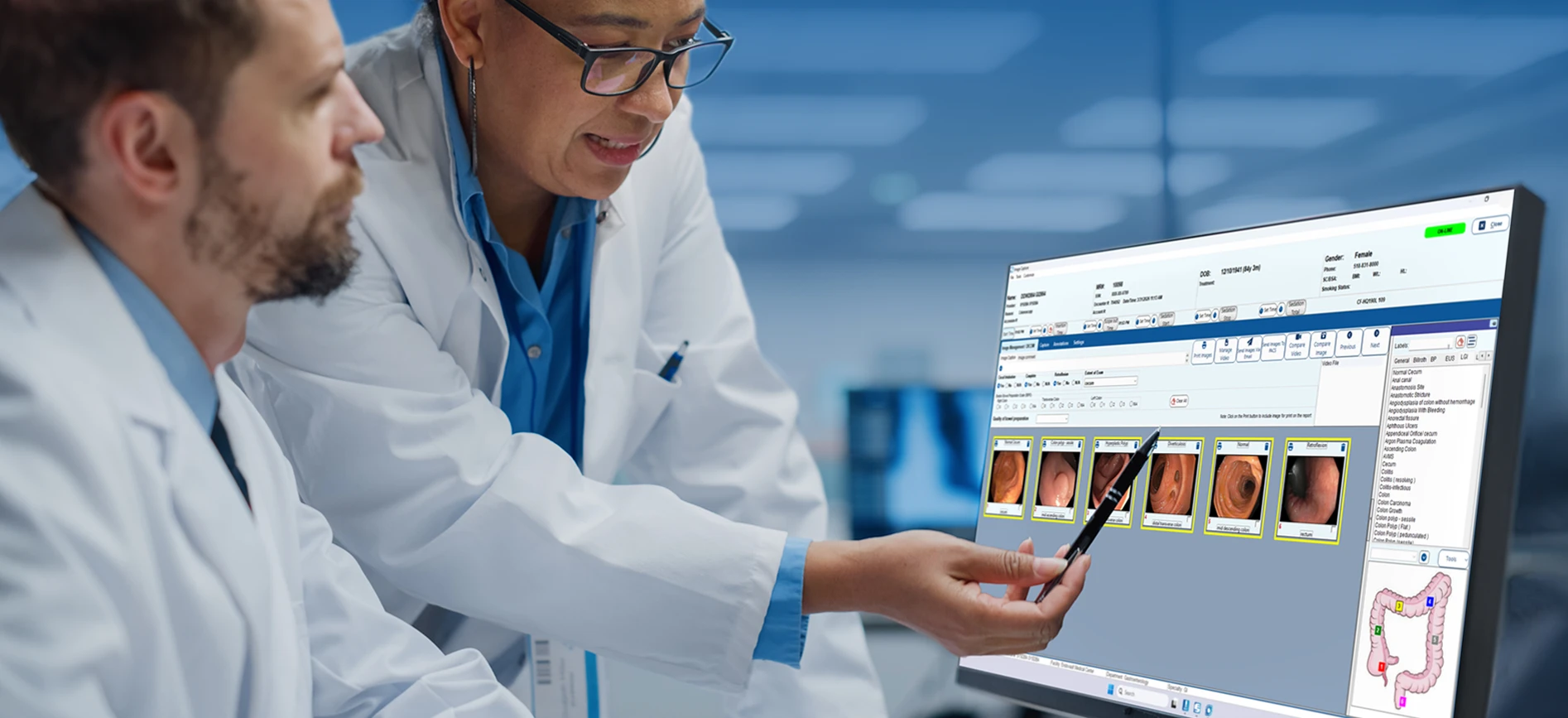 two people looking at a computer screen showing endovault image capture